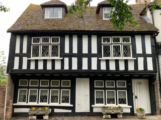 Old medieval half timbered Tudor cottage at The Mint street. Charming medieval town. Architecture,...