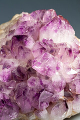 Amethyst violet purple crystal. The texture of precious and semi-precious stones.