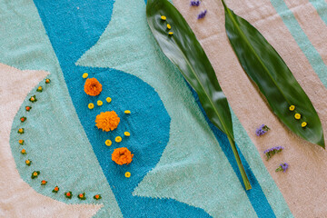 Blue and teal mandala with flowers