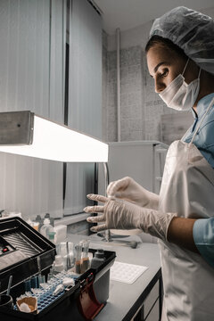 The nurse is preparing to perform a blood group cross-method