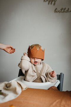 Picture of an adorable baby with a crown