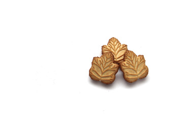 Delicious cookies filled with vanilla cream made with honey or maple syrup from Canadian trees, the traditional sweet of Canada on a white background	