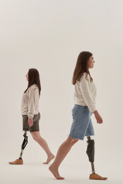 Positive amputees walking in different directions