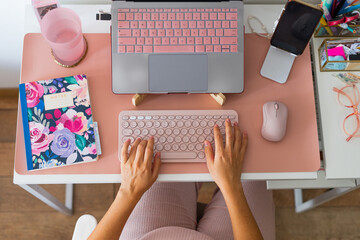 hands working on a home desktop