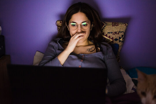Woman reacting to video online