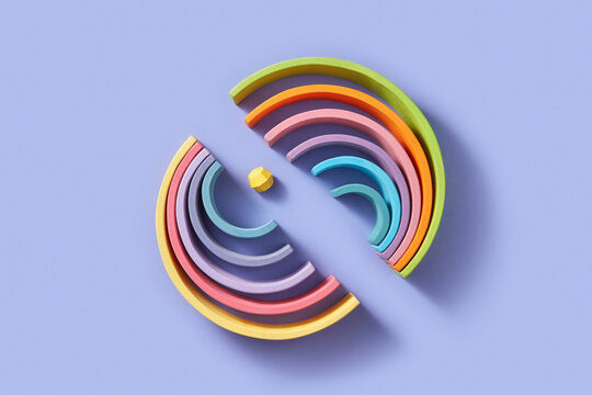 Small yellow ball arranged with curved wooden blocks