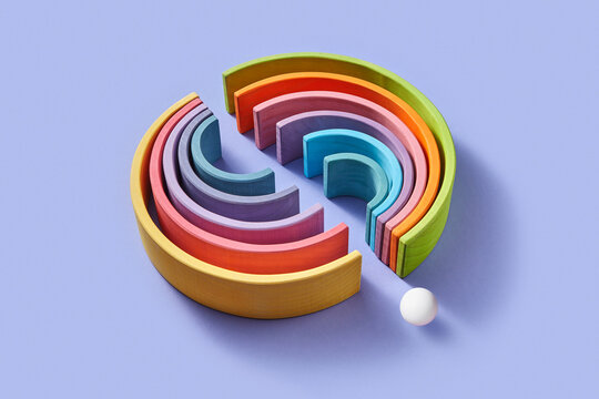 Arched wooden planks of with path for small ball