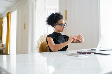 Obraz premium Female designer in the office online training, computer work, surfing the Internet