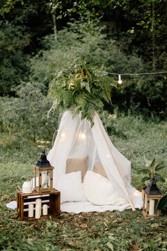 rustic style arrangement in wedding arch shape for outdoor ceremony 