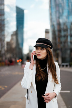 Businesswoman making a business call outdoor