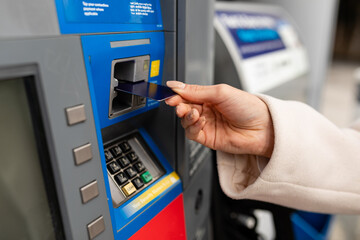 Person Uses Card At Gas Pump