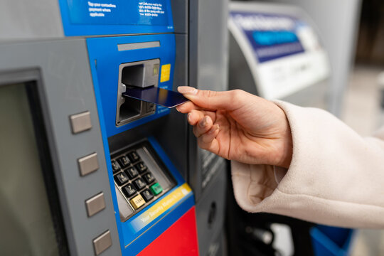 Person Uses Card At Gas Pump