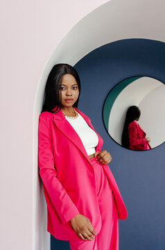 Black woman in studio with mirror