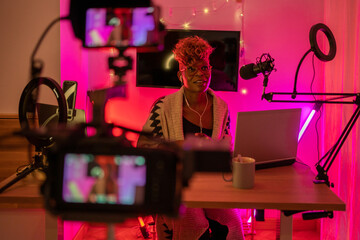 Cool Black Woman Youtuber On A Live Stream From Home.