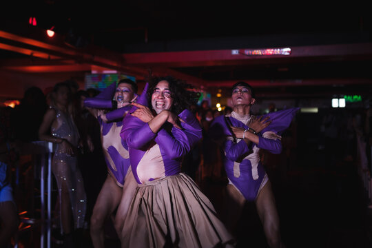 Group of drag queens performing at a club