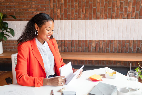 Event manager businesswoman making letters