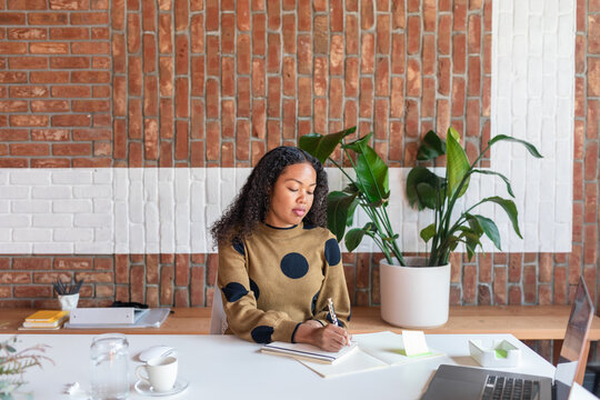 Well dressed business woman working in workplace