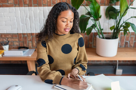 Project manager woman working planning the day at office