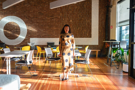Pretty businesswoman alone at cowork site