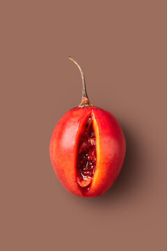 Cut juicy tamarillo fruit