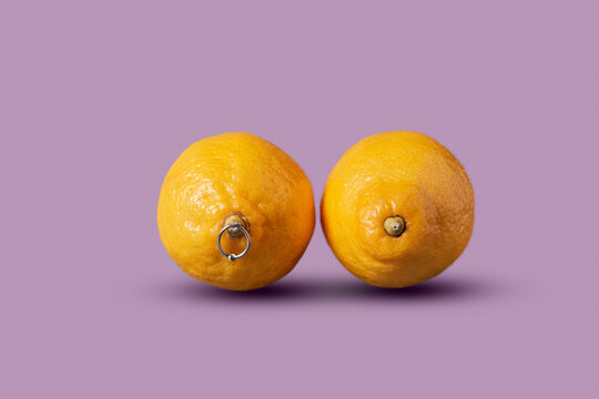 Two yellow lemons with earring