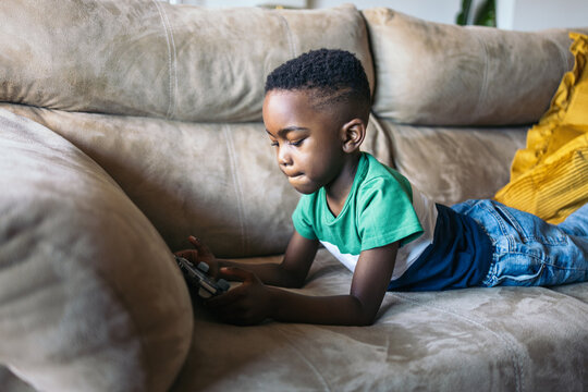 Kid playing with a game console