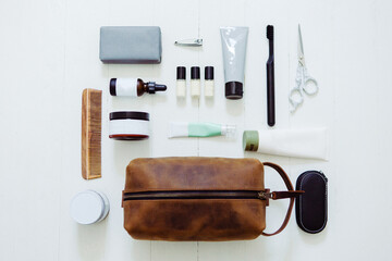 Men's Leather Toiletry Cosmetic Bag with Self Care Products Flatlay