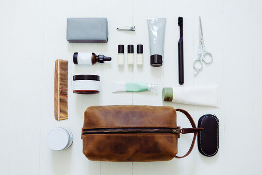 Men's Leather Toiletry Cosmetic Bag With Self Care Products Flatlay