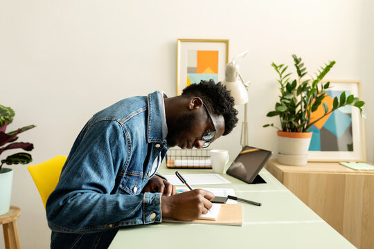 African man working at desk