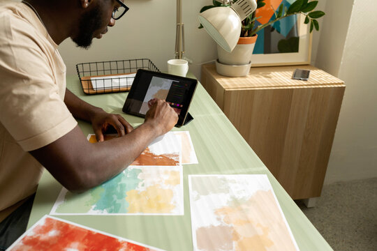 Graphic Illustrator Digitizing Abstract Designs On Tablet