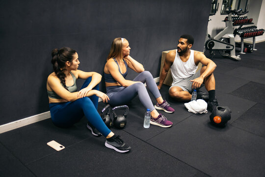 Group Of Friends Resting At Gym