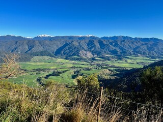 Looking across to the Southern Alps from Takaka hill. 