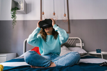 Female gamer adjusting VR headset