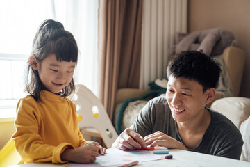 Asian father and daughter