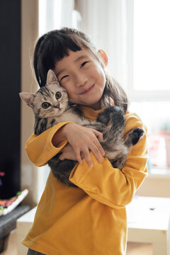 Cute Asian girl at home 