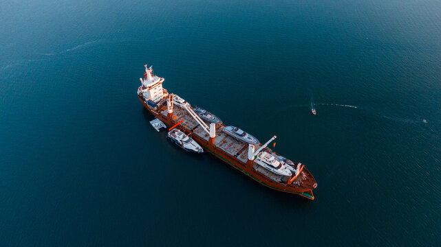 Cargo ship transporting yachts