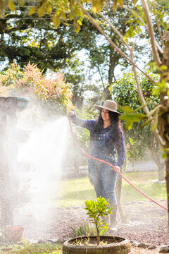 woman watering the plants
