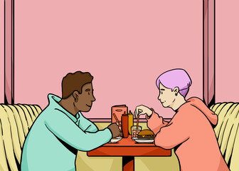Diverse couple having dinner together