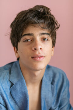Teen boy wearing jacket and shirtless portait