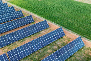 Renewable energy: Solar panel farm plant drone shot