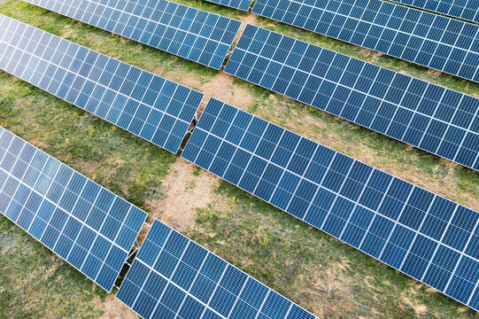 Renewable energy: Solar panel farm plant drone shot