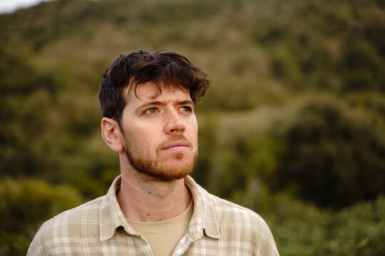 Portrait of confident man in nature