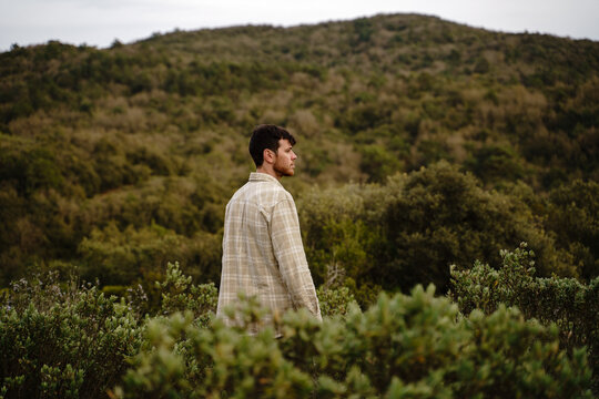 Portrait of confident man in nature