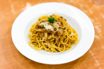 A dish of spaghetti on the table