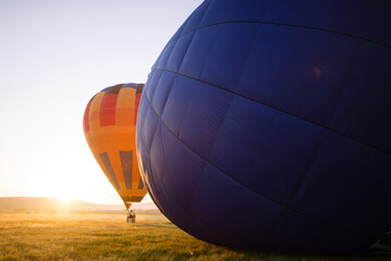 Hot air balloons in morning sunlight