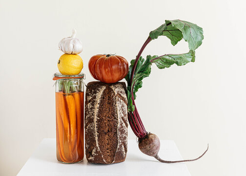 Still life of bread and vegetables