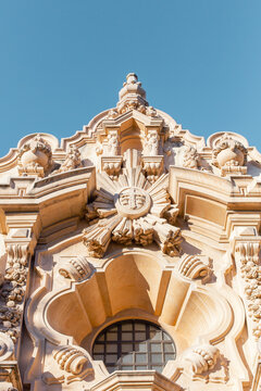 Ornate Spanish Style Building with Rose Window and Sunburst