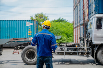 Working in cargo container warehouse industry factory site in export, import, and transportation concept.