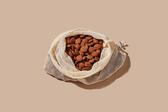 textile mesh bag with shelled almonds