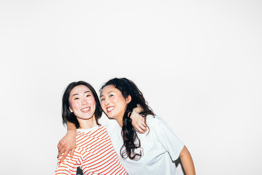 Two Asian Women Posing in Studio